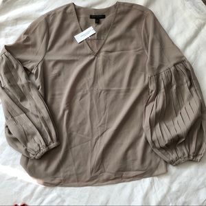 NEW WITH TAGS! Tan blouse with billowed sleeves